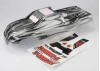 Traxxas T-MAXX ProGraphix Body (long wheelbase) (replacement for painted body. Graphics are painted- requires paint and final color application)/ window grill lights decal sheet