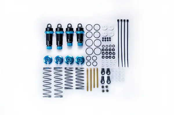 Koswork AE RC10 Big Bore 12mm Buggy Shock Set (F&R) (4) Blue — image 5 of 5