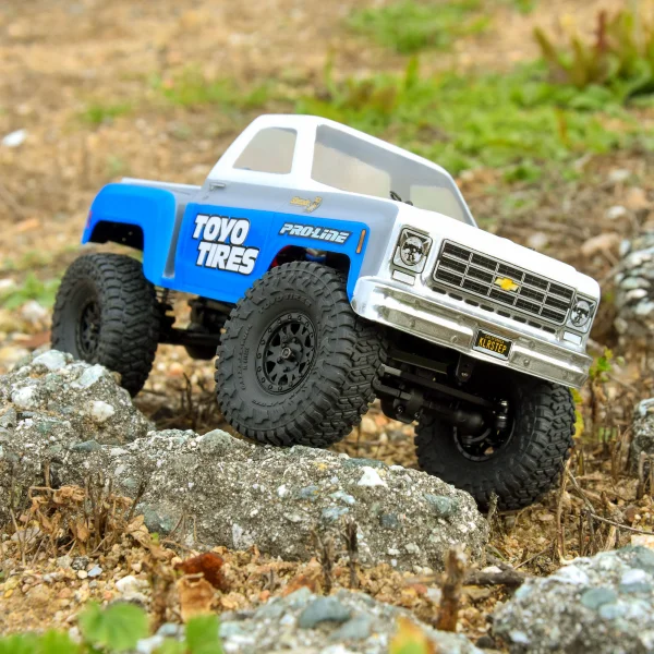 ProLine 1.0 Toyo Open Country R/T Trail Tyres Mounted on 7mm Hex Black IMPULSE Wheels (4)