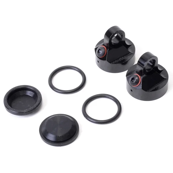 Schumacher Vented Big Bore Shock Caps - 1 Pair