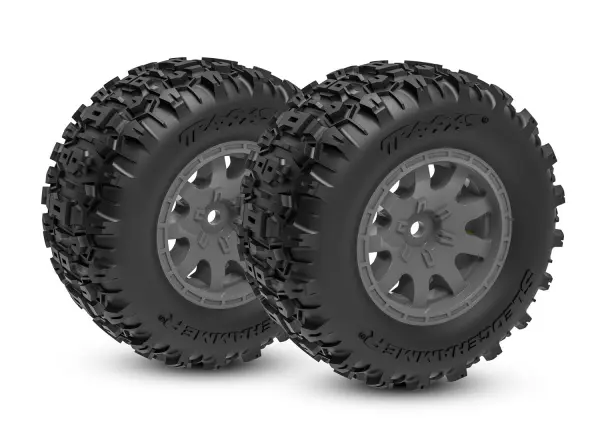 Traxxas Tyres + wheels, assembled (charcoal gray wheels, dual profile (2.1 outer, 2.6 inner), Sledgehammer tyres, foam inserts) (rear) (2) &mdash; image 2 of 2