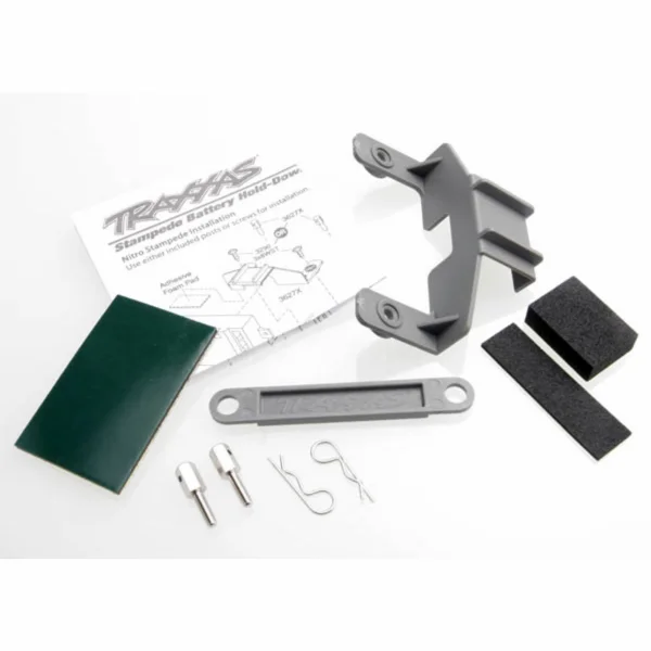 Traxxas Battery hold-down (grey) (1) / receiver hold-down (grey) (1) / metal posts (2)/ spacers (2)/ body clips (2)/ servo tape/ adhesive foam pad