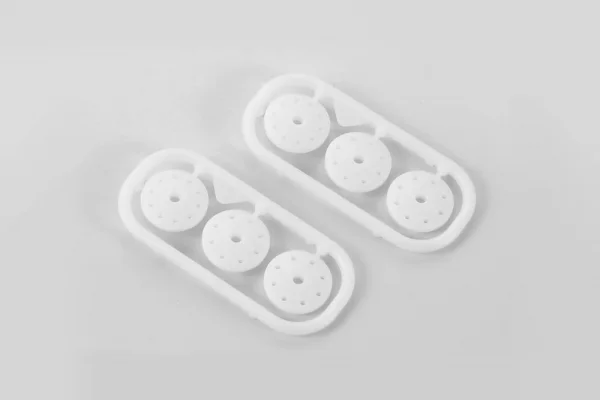 XRay XB9 Shock Piston Set 8-Hole (1.2; 1.3) 10-H. (1.1mm) — image 1 of 3
