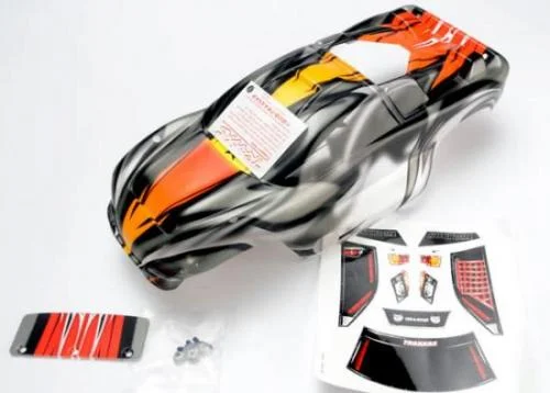 Traxxas Body Nitro Rustler ProGraphix (Replacement for the painted body. Graphics are painted requires paint final color application.)/window grill lights decal sheet/ wing and Aluminium hardware — image 2 of 3