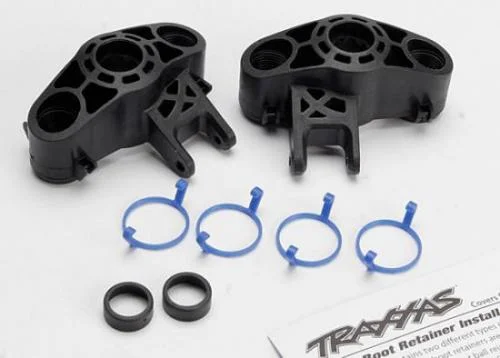 Traxxas Axle carriers left right (1 each) (use with larger 6x13mm ball bearings)/ bearing adapters (for 6x12mm ball bearings) (2)/ dust boot retainers (4) &mdash; image 2 of 3